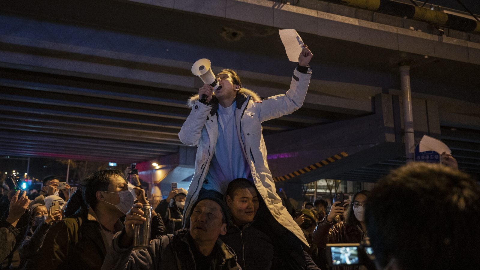 Graffiti, flyers, word of mouth: China’s protesters embrace low-tech organizing to escape surveillance