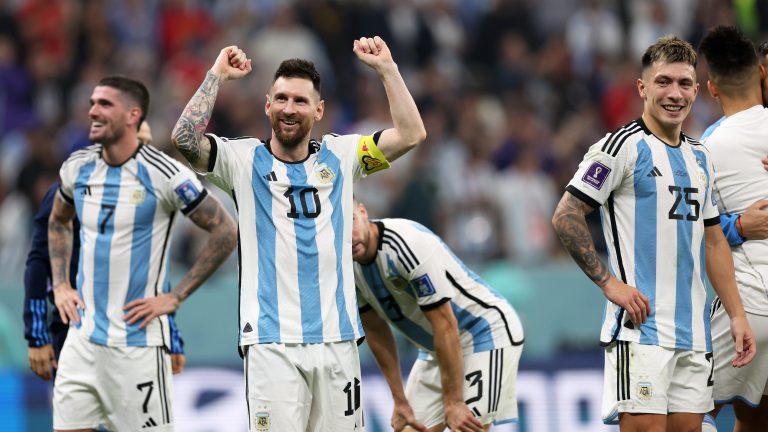 A photo of Lionel Messi of Argentina celebrating with his team.