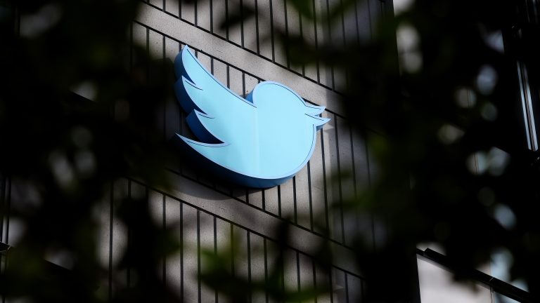 The Twitter logo is posted on the exterior of Twitter headquarters.