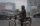 A photo of a man sitting on a motorbike on a busy street in Lahore, Pakistan.